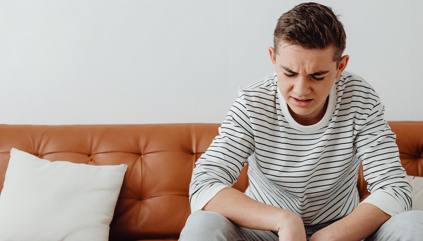 Image of Young man in Entrusted to Him Christian streetwear representing a new year of honest faith, confession before God, and the forgiveness of 1 John 1:9