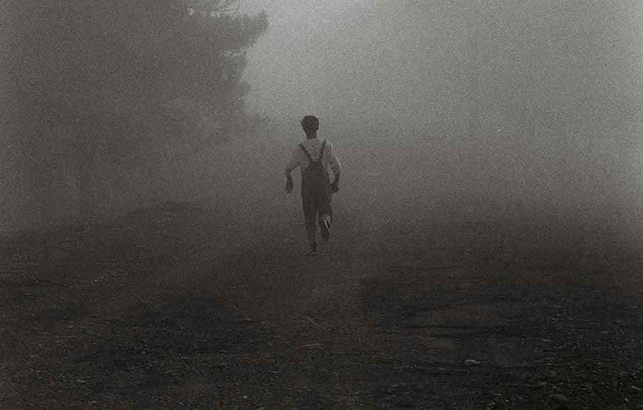 Image of Young man in faith-based Christian streetwear from Entrusted to Him, representing courage, integrity, and the call to flee sin — inspired by Joseph and 1 Timothy 6:11