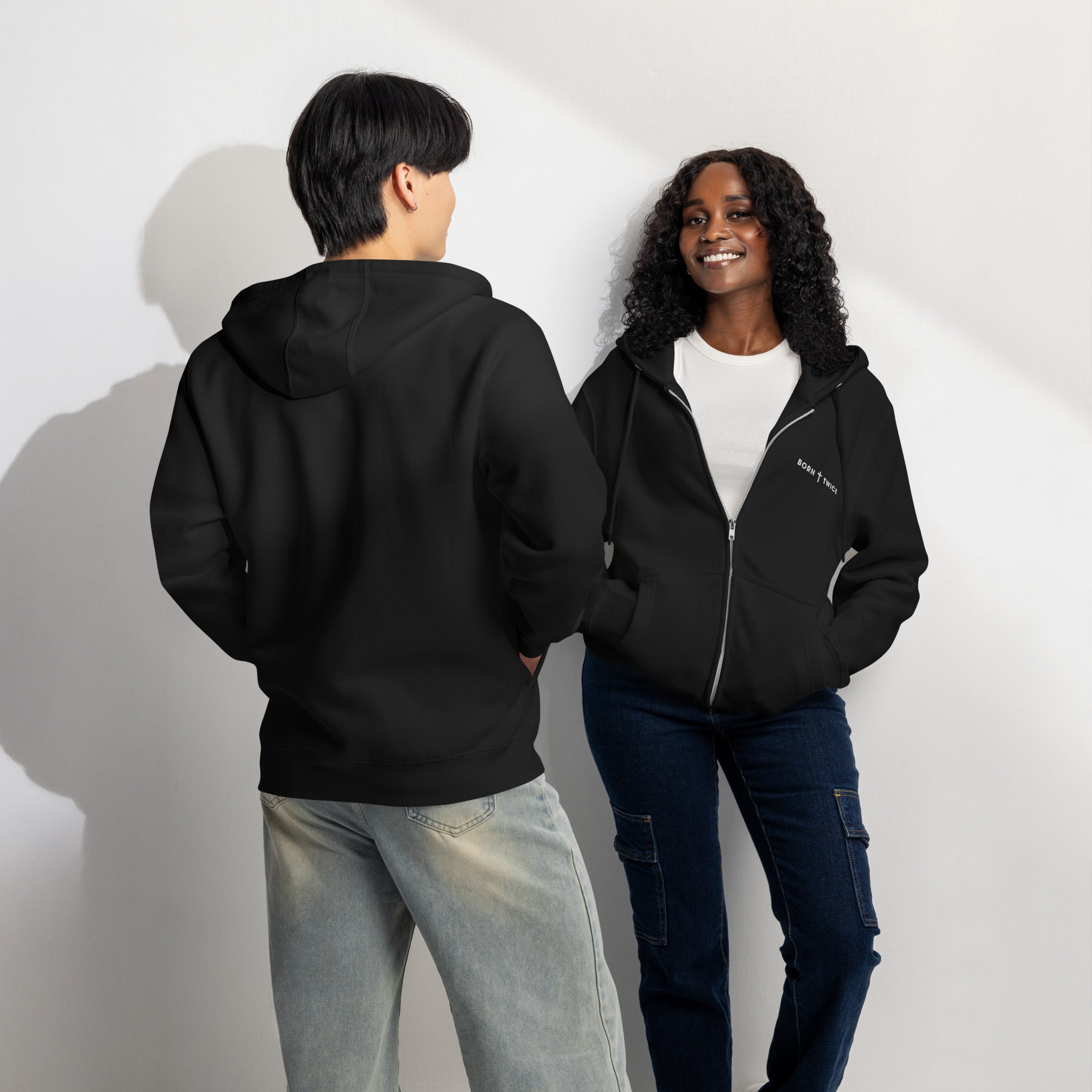 Image of Born Twice Premium Zip Hoodie black lifestyle couple — Christian apparel born again John 3:3
