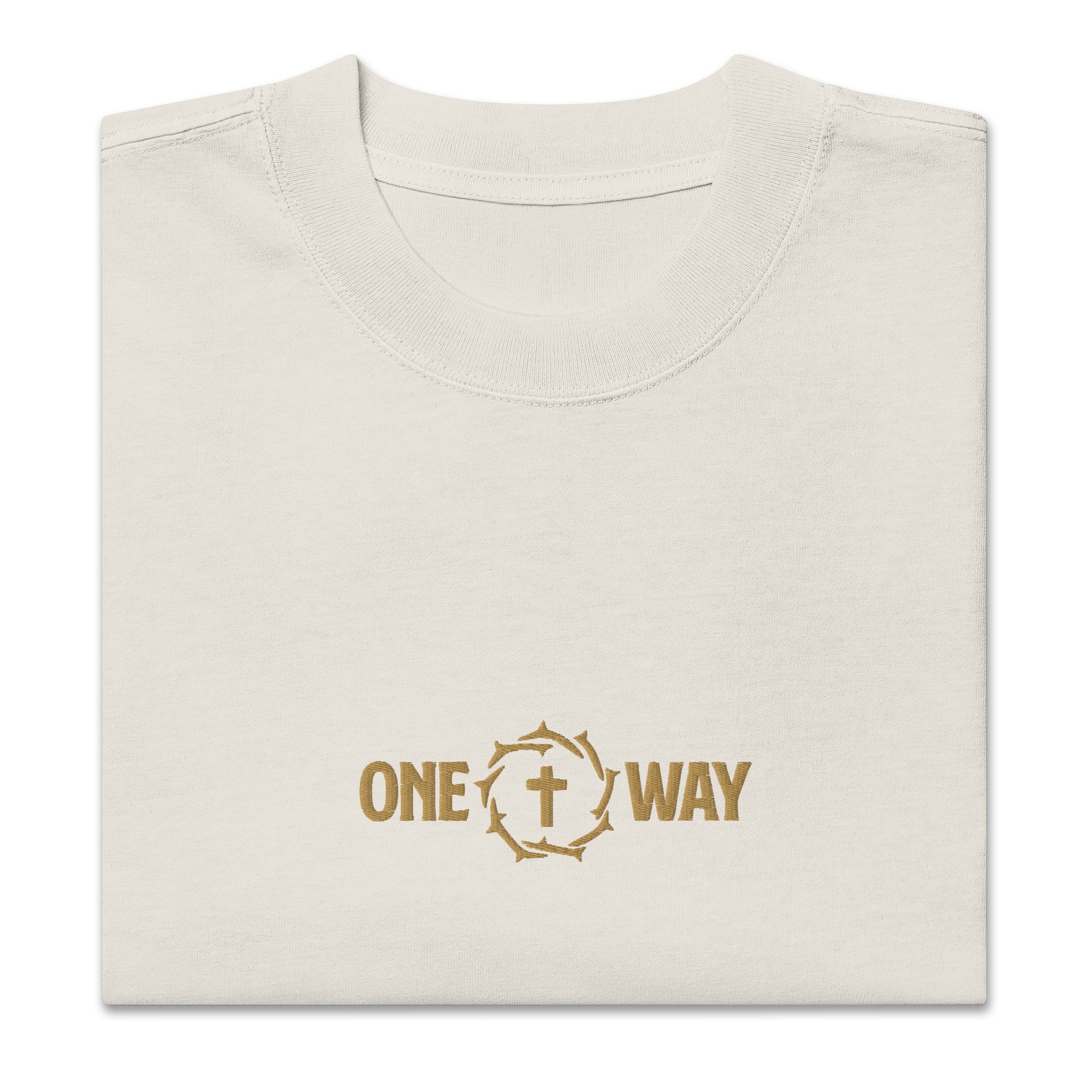 Image of Folded One Way embroidered oversized faded t-shirt in faded bone showing the cross and crown of thorns design