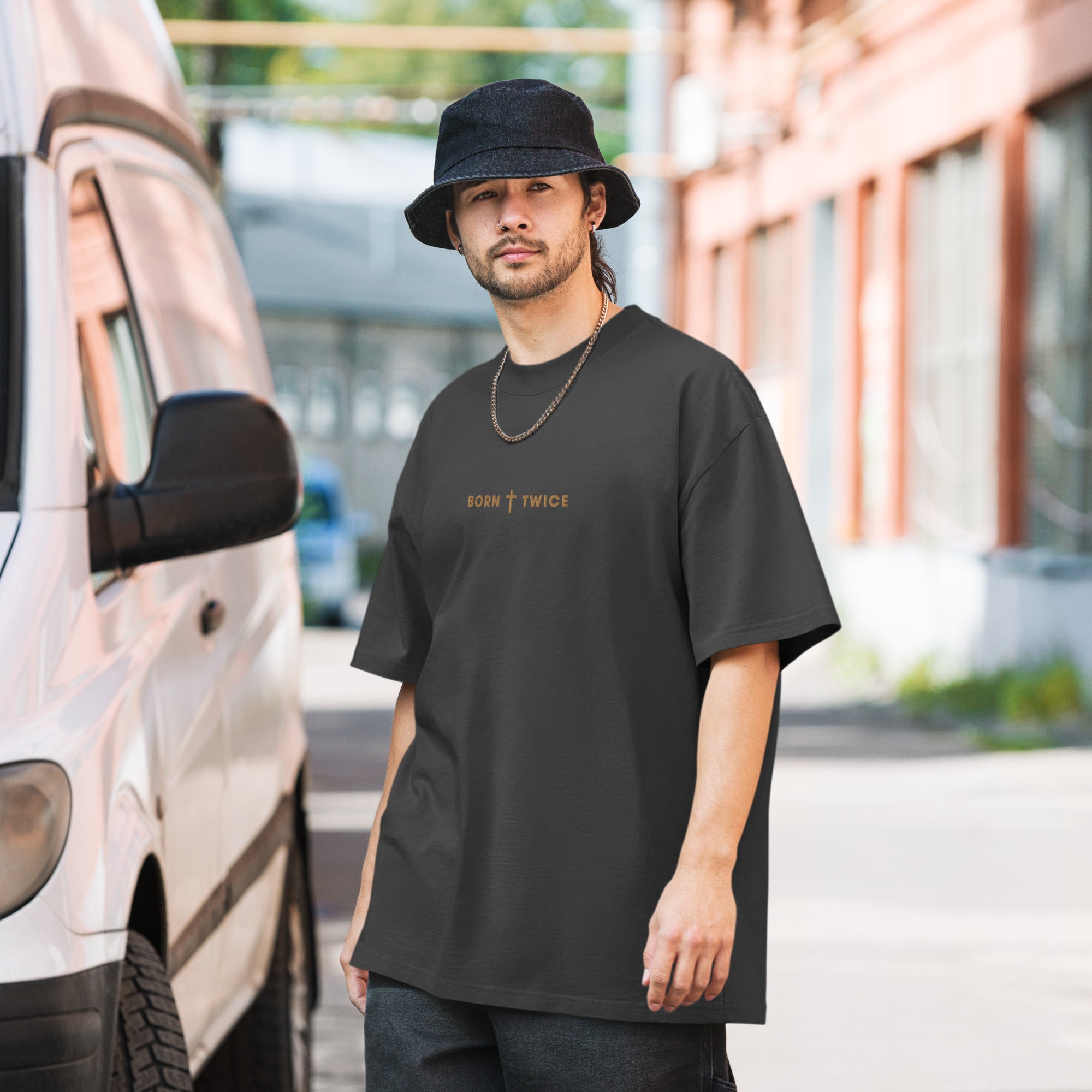 Image of Born Twice Bible verse shirt faded black front lifestyle view — Entrusted to Him