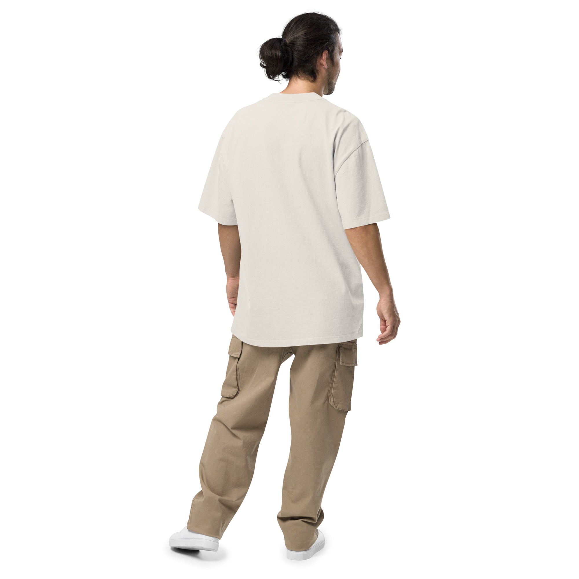 Image of Back view of a model wearing the Faded Bone oversized faded tee with dropped shoulders and a plain back