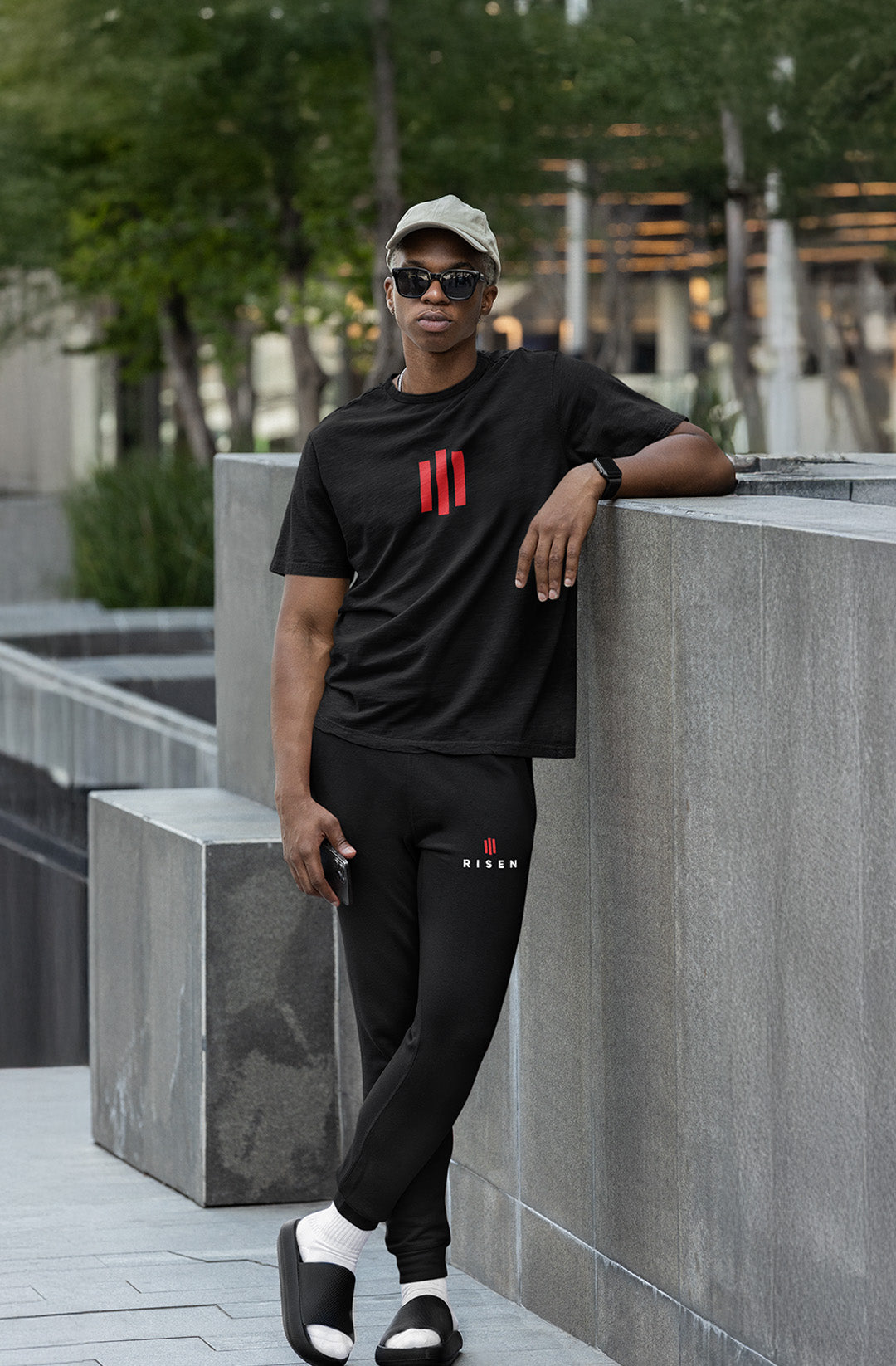 Risen Christian apparel collection — men wearing Risen premiun shirt, sweatpants, and oversized tee by Entrusted to Him