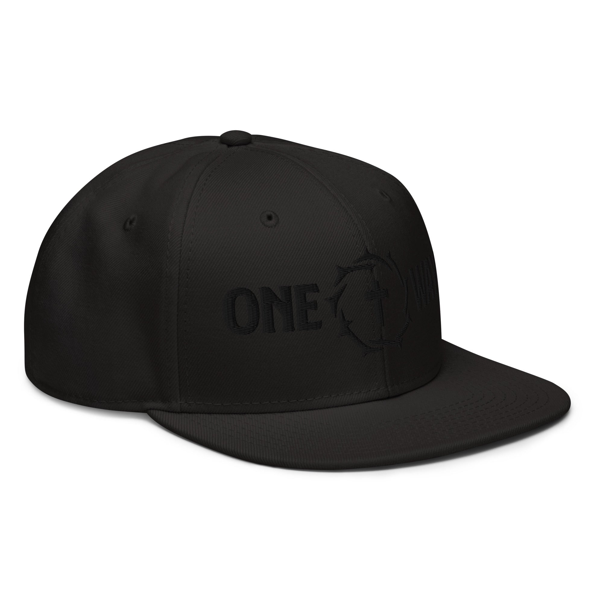 Image of One Way black-on-black snapback hat with cross and crown of thorns design, angled front view