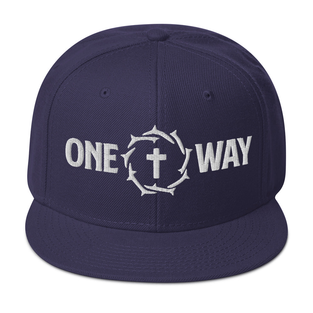 Image of One Way embroidered snapback hat in navy blue with cross and crown of thorns design, front view