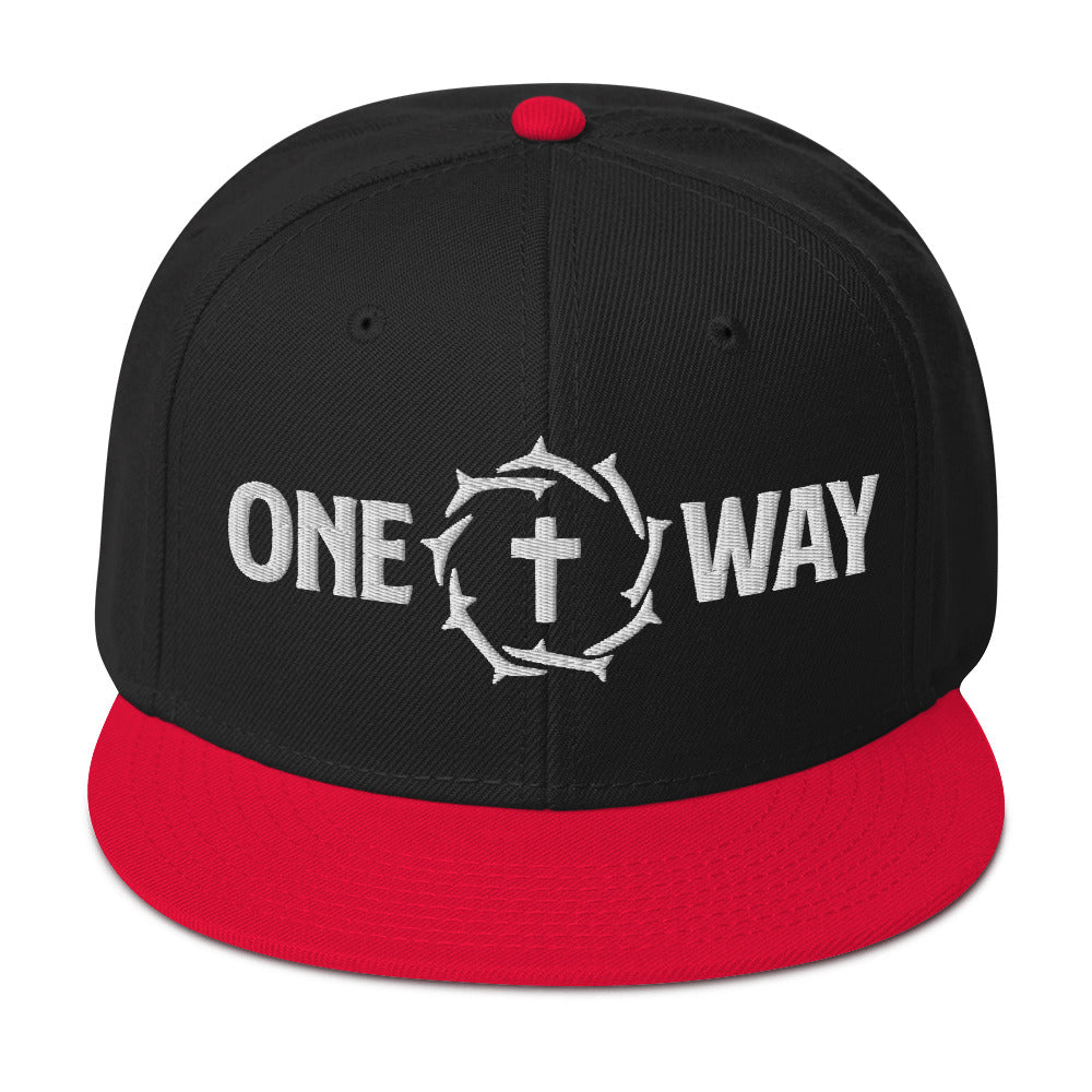 Image of One Way embroidered snapback hat in black with red visor, showing the cross and crown of thorns design, front view