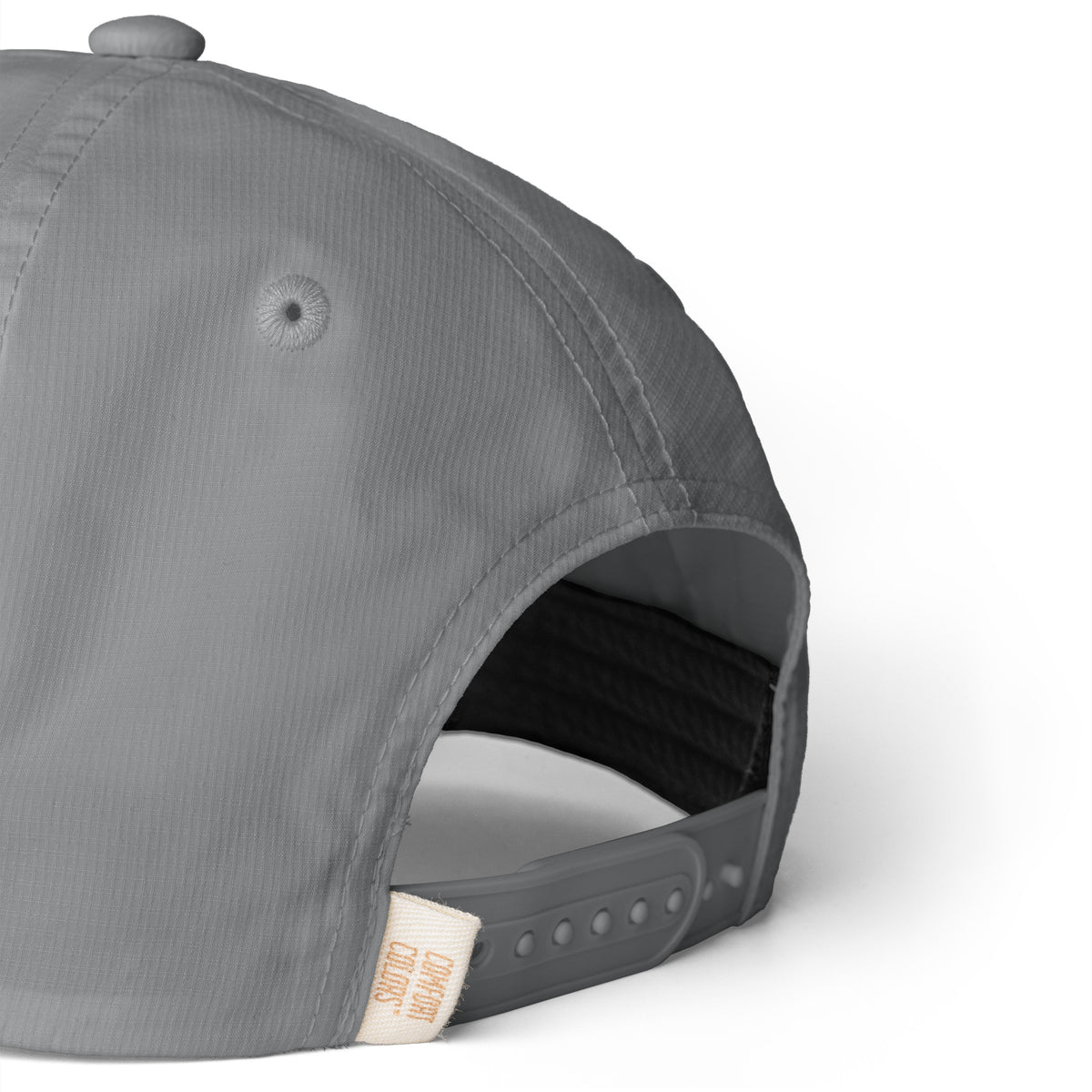 Granite gray Entrusted 3D Puff Rope Cap, close-up of the ripstop fabric and snapback strap