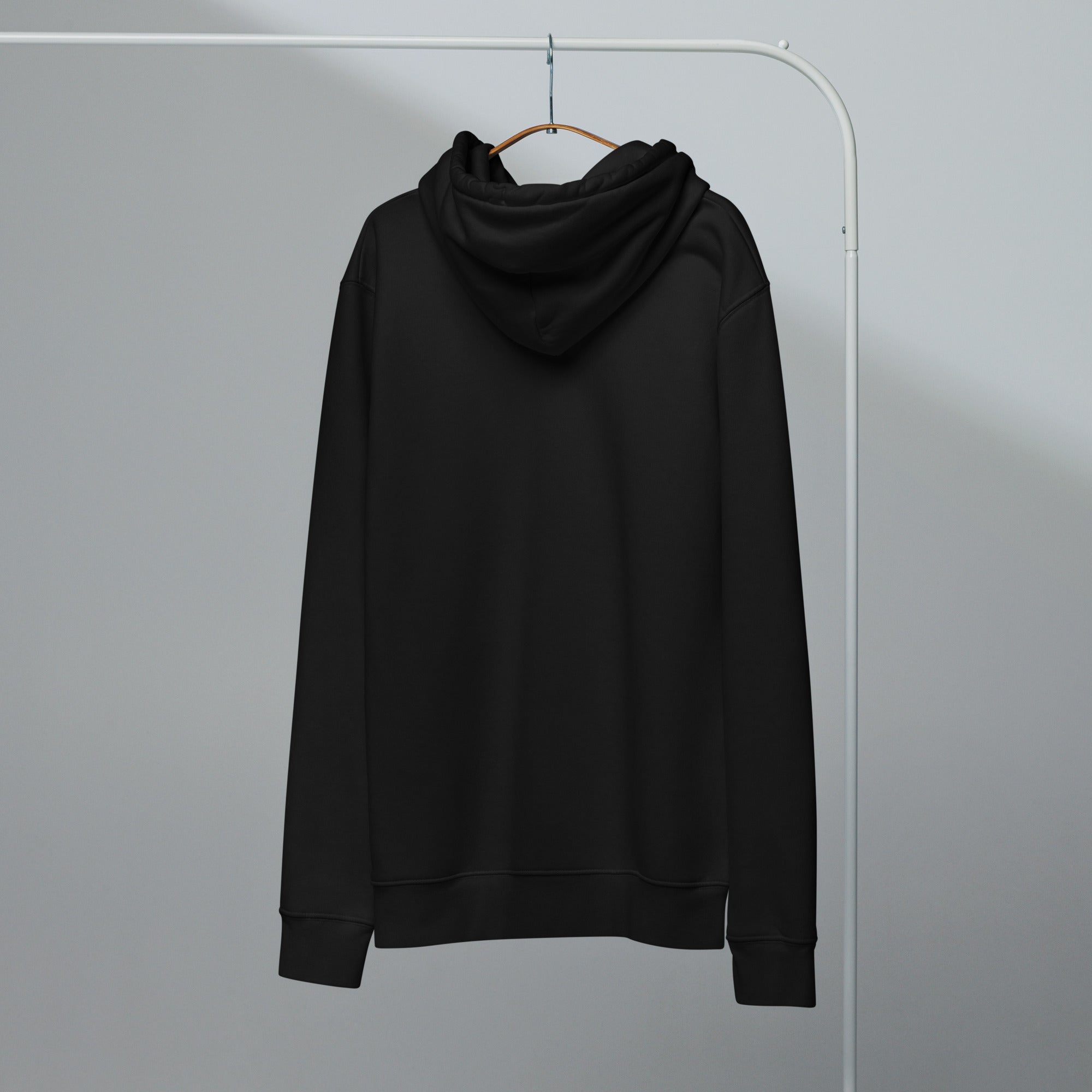 Image of Grace Abounds Christian hoodie black back close-up — Entrusted to Him