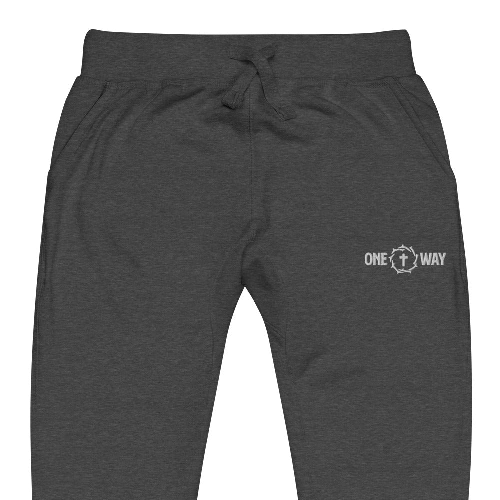 Image of Close-up of the waistband, drawstring and logo on the One Way fleece sweatpants in charcoal heather