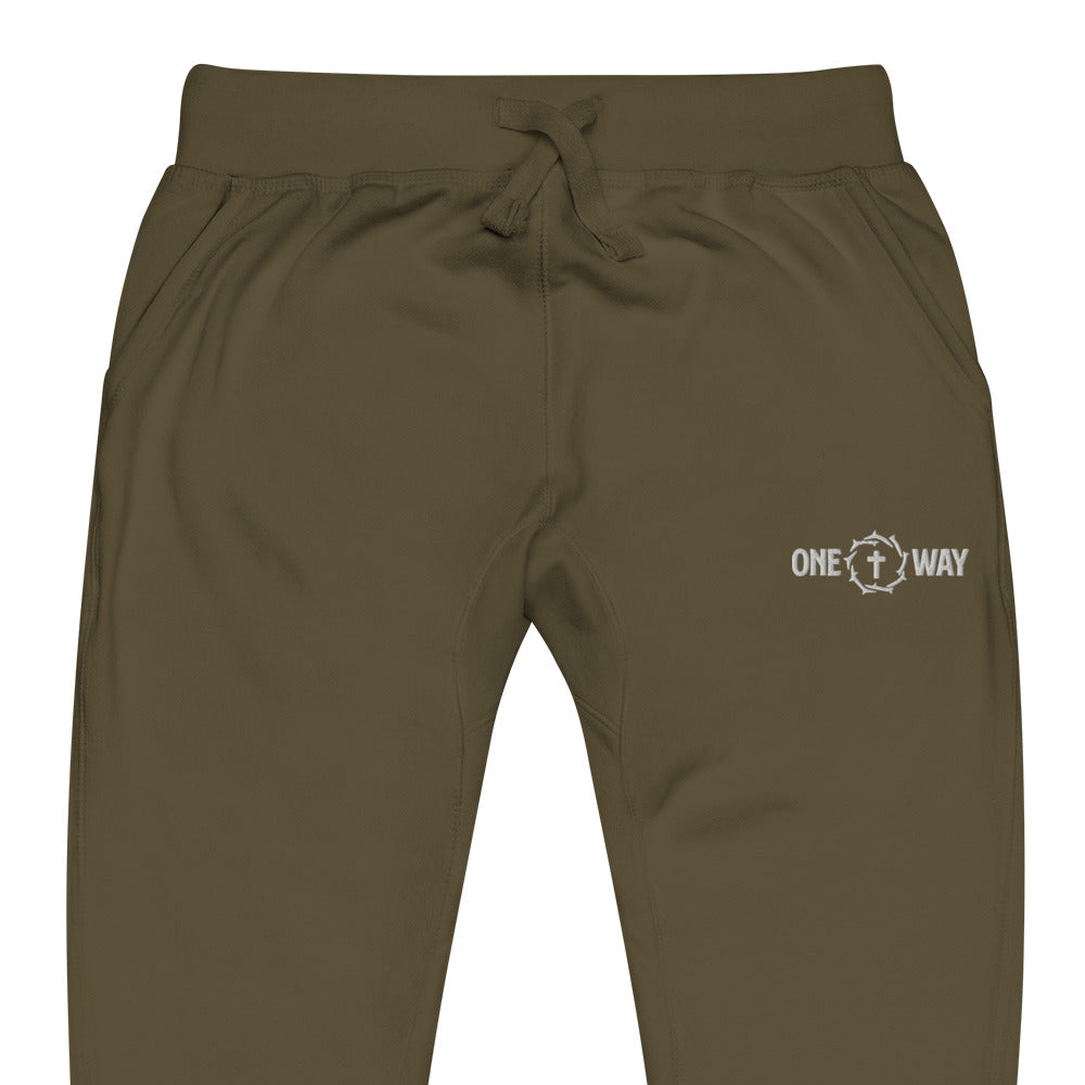Image of Close-up of the waistband, drawstring and logo on the One Way fleece sweatpants in military green