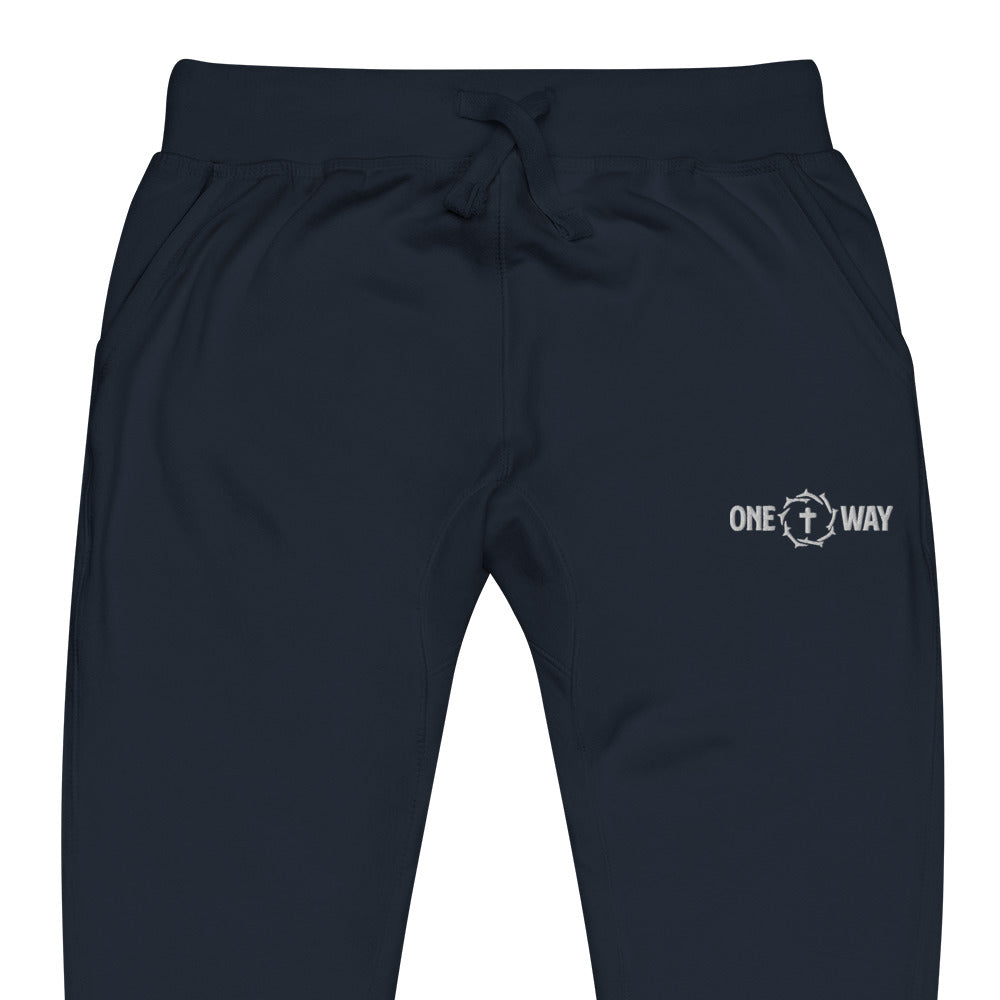 Image of Close-up of the waistband, drawstring and logo on the One Way fleece sweatpants in navy blazer
