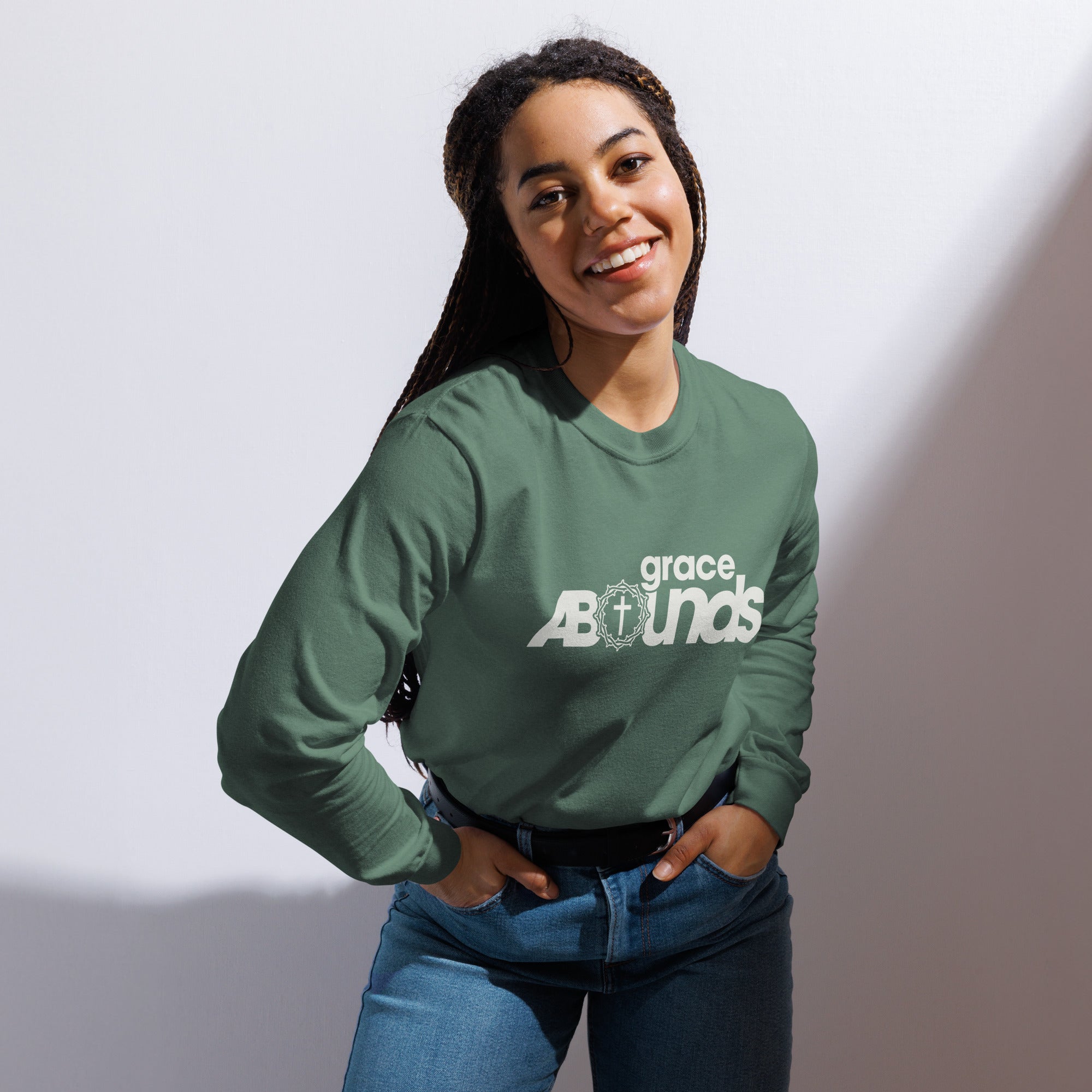 Image of Grace Abounds jesus shirt light green detail front — garment-dyed christian long sleeve