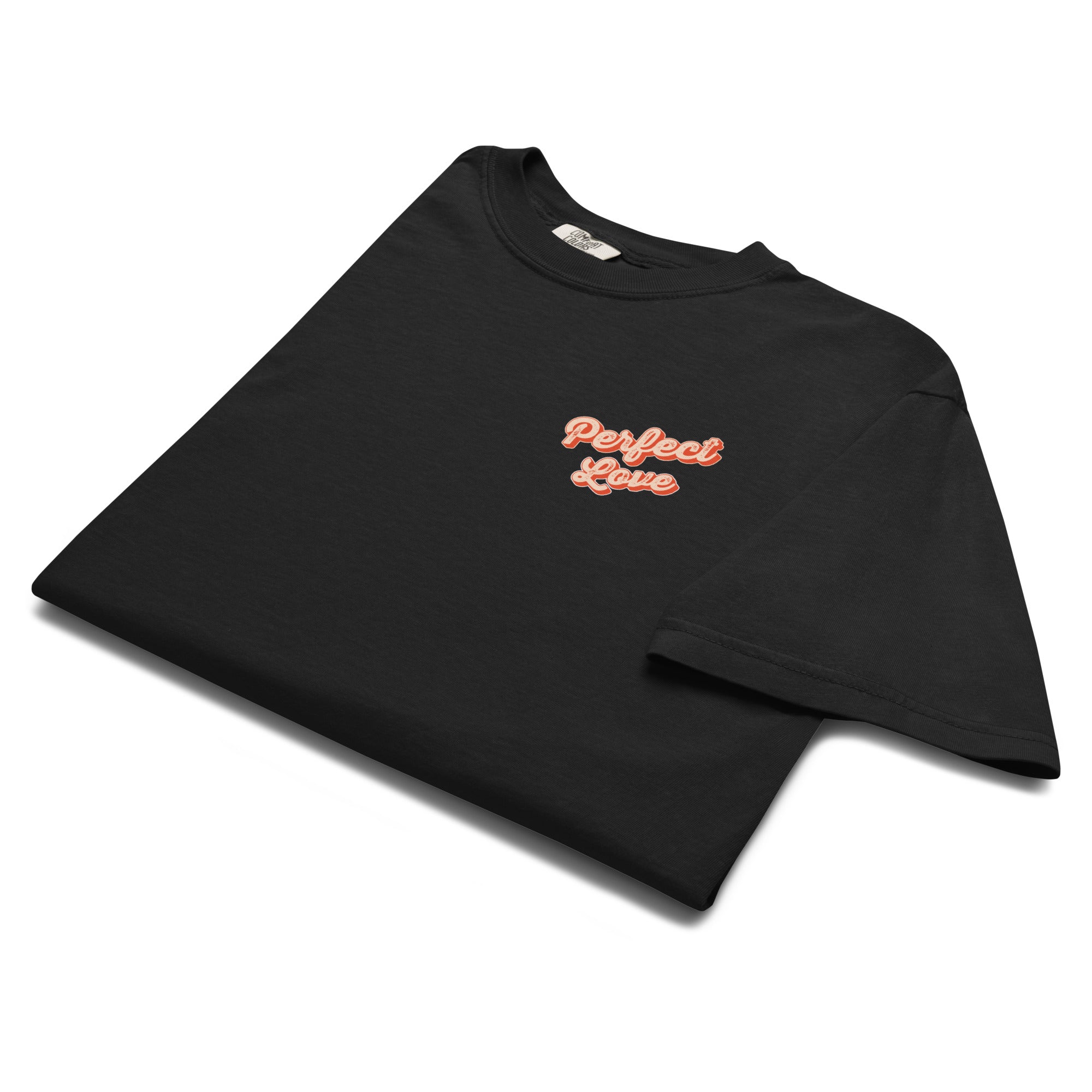 Image of Perfect Love scripture t-shirt black folded flat lay — Entrusted to Him