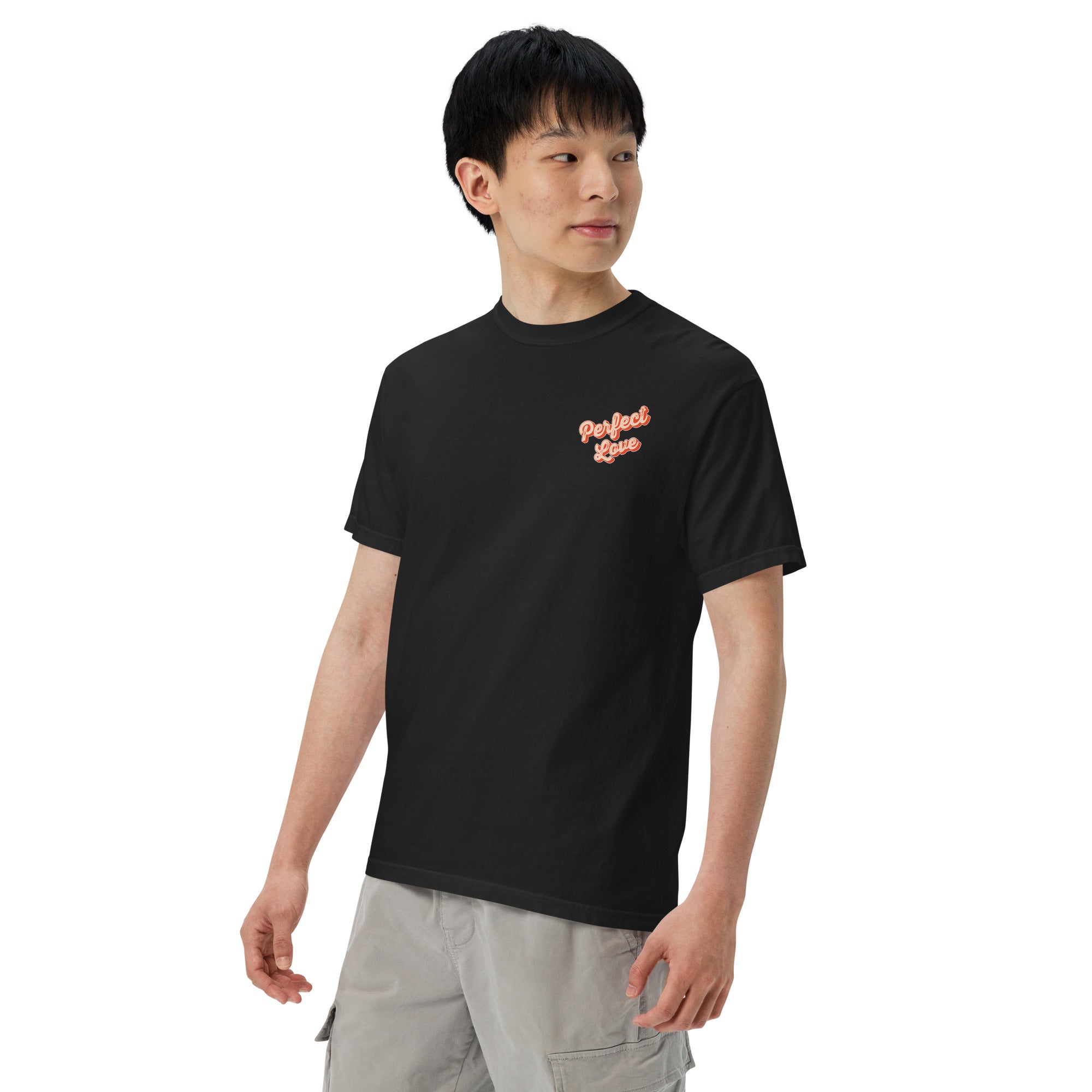 Image of Perfect Love scripture t-shirt black front on model side angle — Entrusted to Him