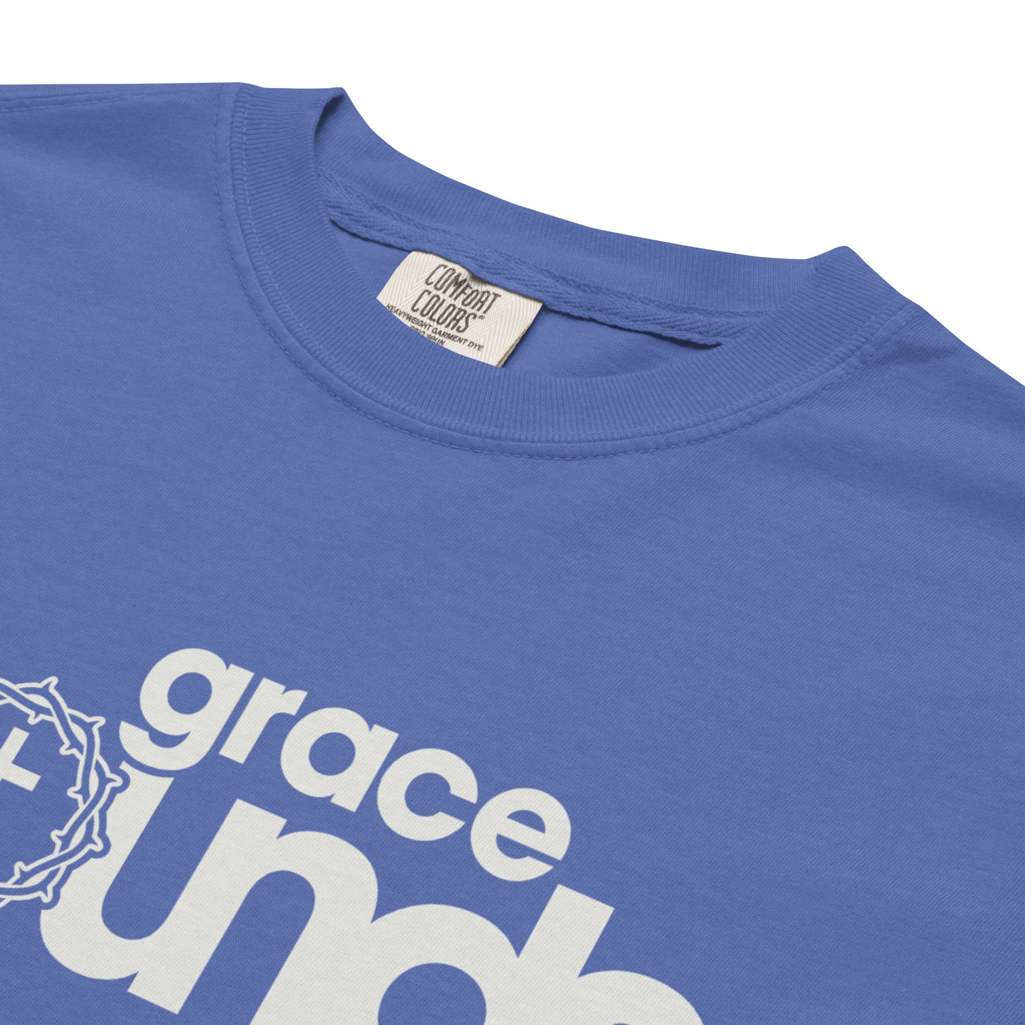 Image of Grace Abounds Christian graphic tee mystic blue close-up detail — Entrusted to Him