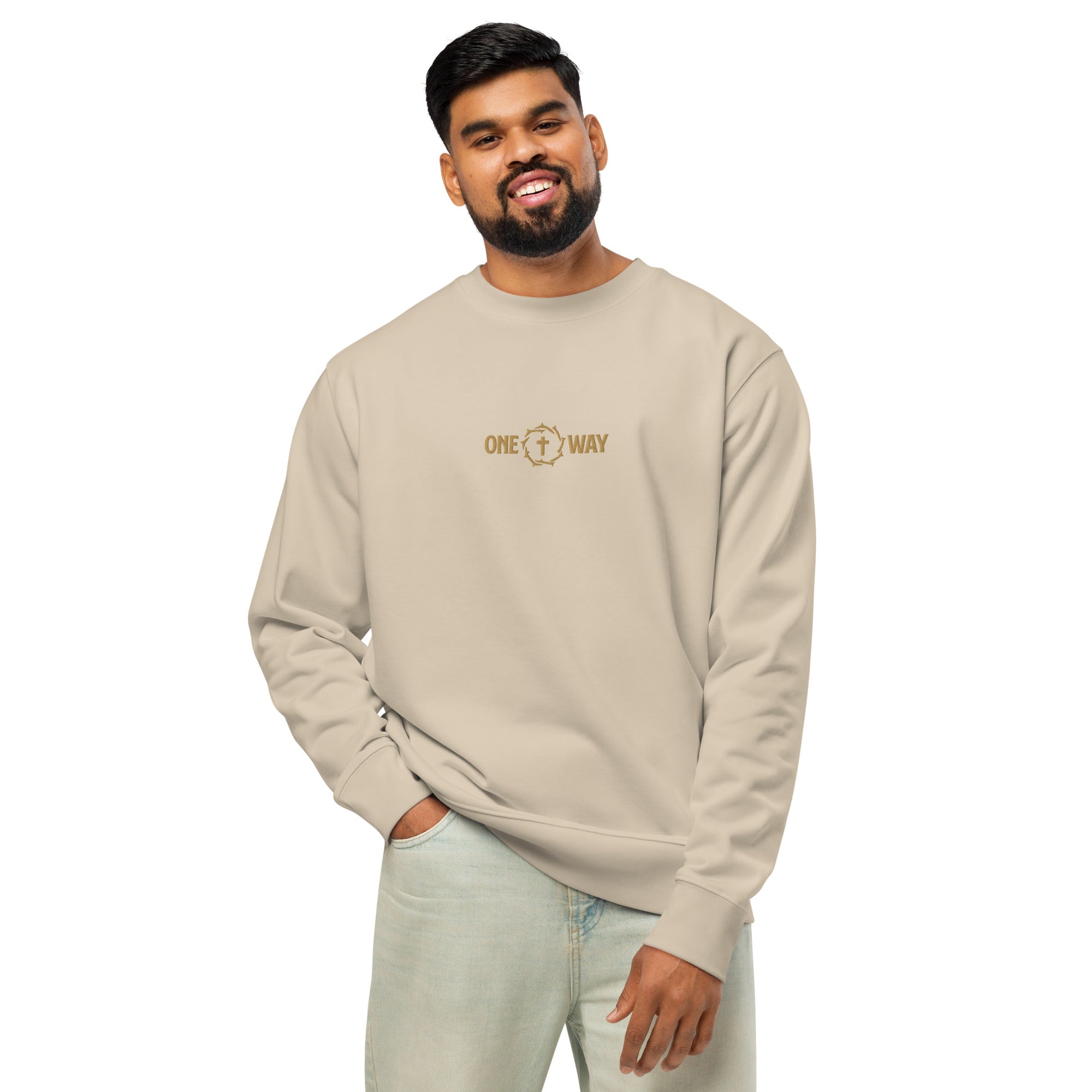 Image of Man wearing the One Way embroidered sweatshirt in desert dust with cross and crown of thorns design