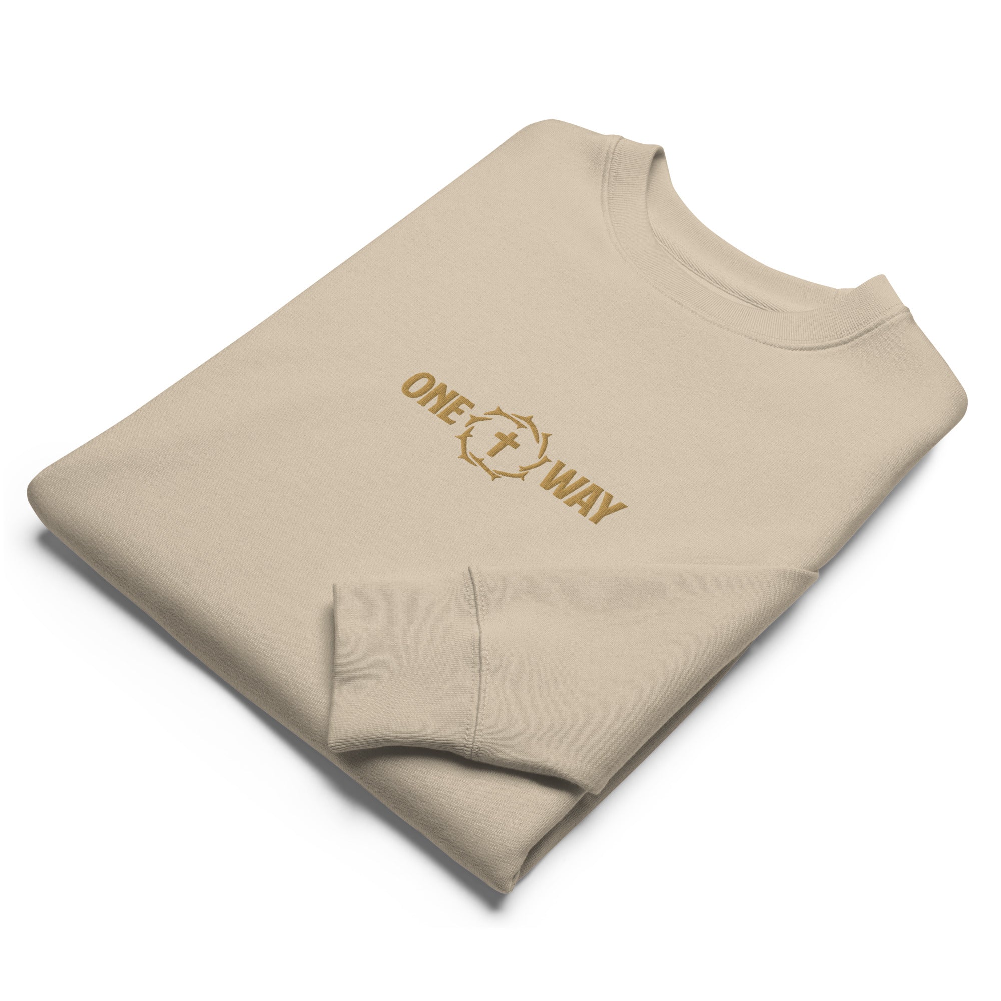 Image of Folded One Way embroidered sweatshirt in desert dust showing the cross and crown of thorns design