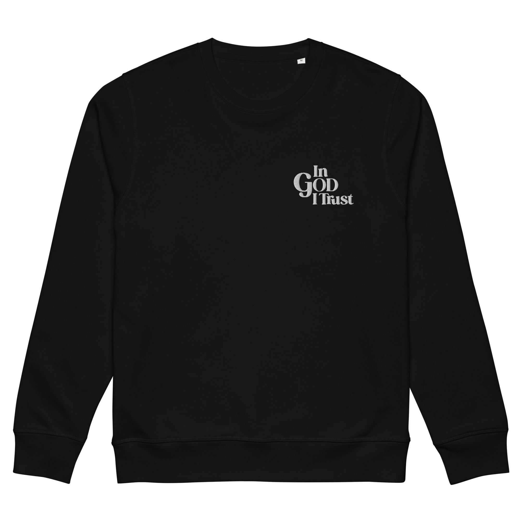Image of Black crewneck sweatshirt, front view, small light grey In GOD I Trust embroidered on the left chest