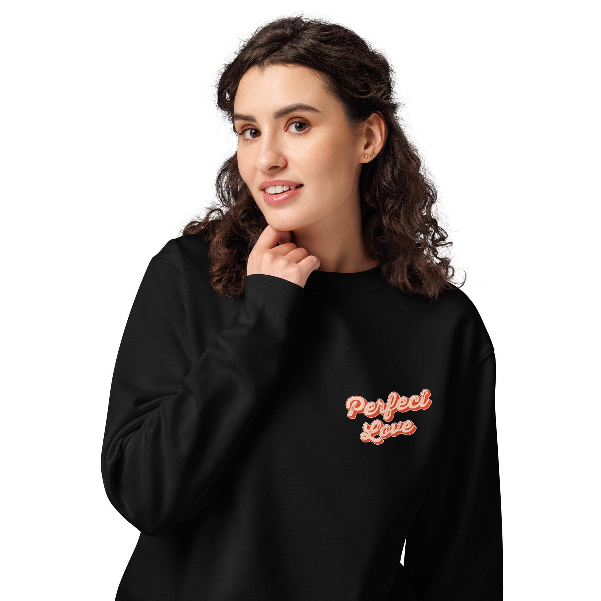Image of Perfect Love faith sweatshirt black front close-up — Entrusted to Him Christian apparel