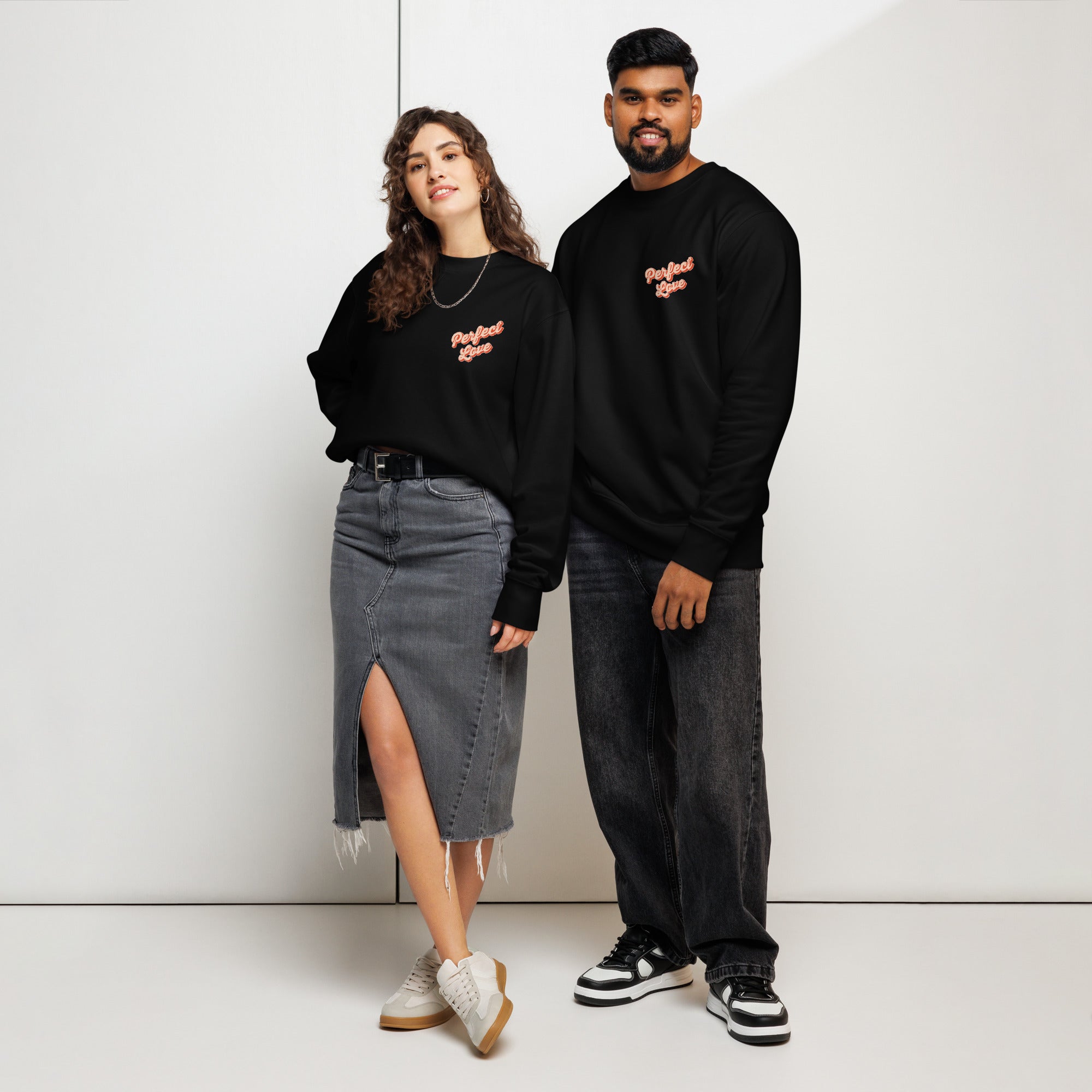 Image of Perfect Love organic Christian sweatshirt black front detail — Entrusted to Him