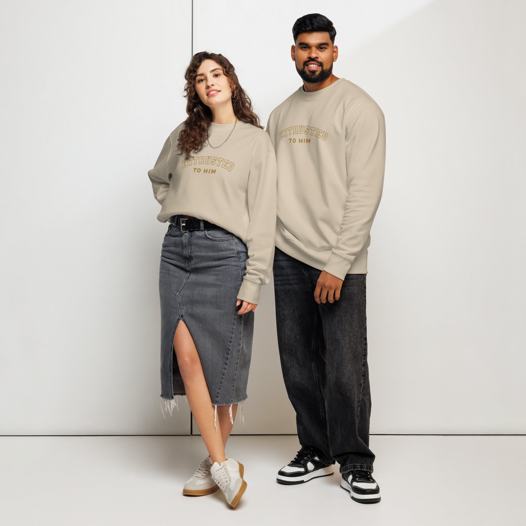 Image of Entrusted varsity embroidered sweatshirt desert dust lifestyle view — Entrusted to Him