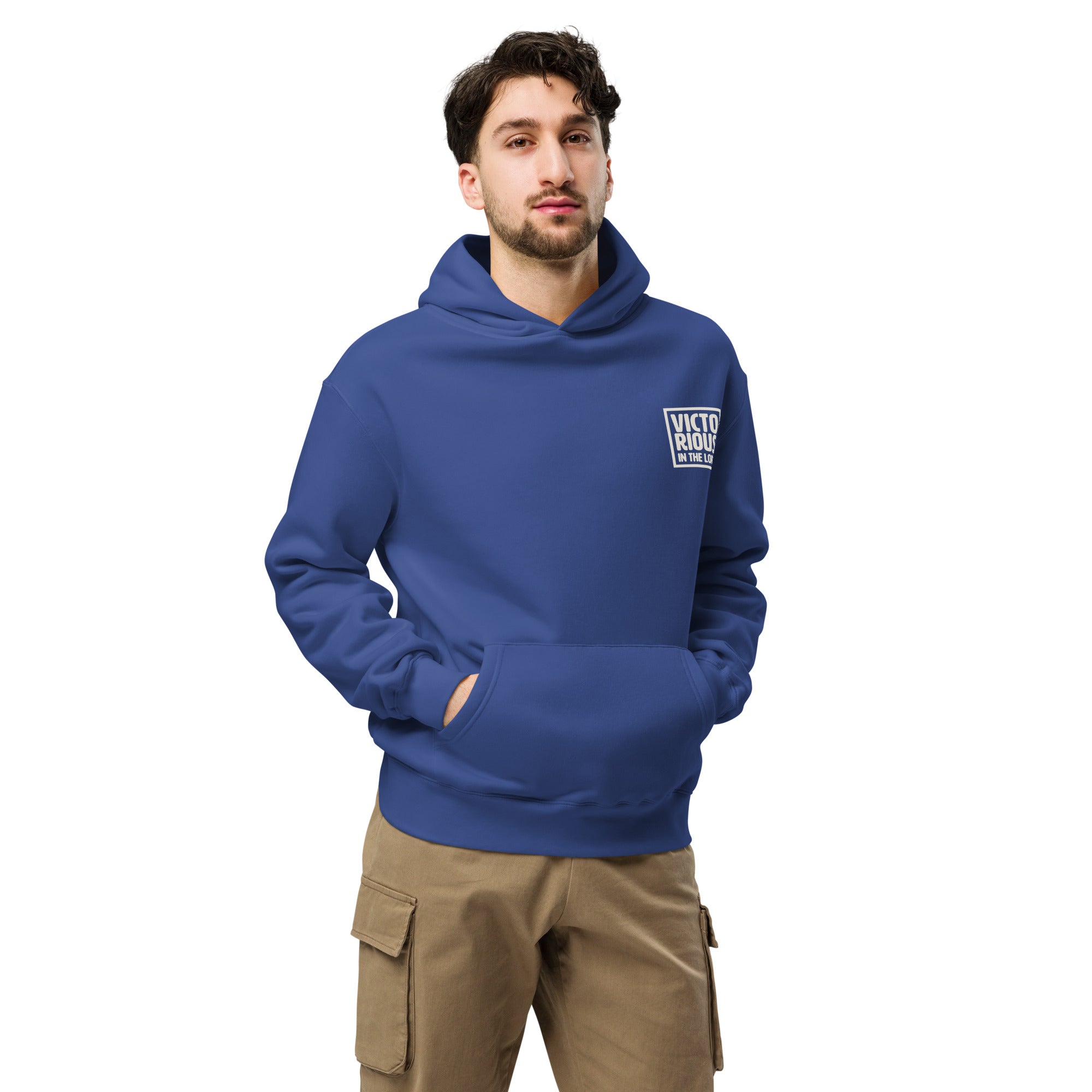 Image of Victorious in the Lord cobalt oversized Jesus hoodie lifestyle front — Entrusted to Him Christian hoodie